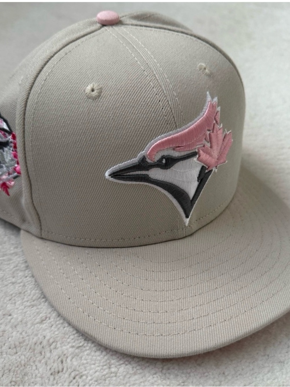 New Era Beige Baseball Cap with Pink Logo Accent